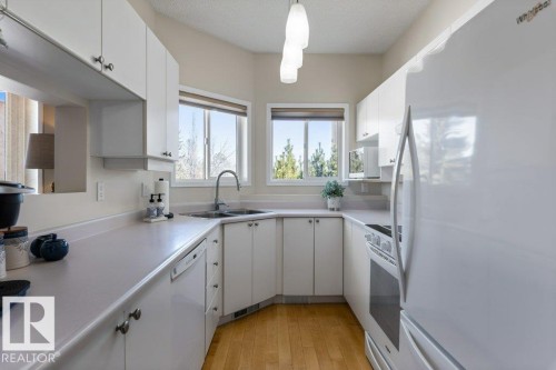 203 15499 Castle Downs Road, Edmonton, AB - Indoor Photo Showing Kitchen With Double Sink