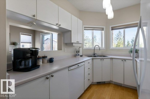 203 15499 Castle Downs Road, Edmonton, AB - Indoor Photo Showing Kitchen With Double Sink