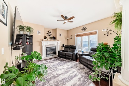 6903 38 Avenue, Camrose, AB - Indoor Photo Showing Living Room With Fireplace