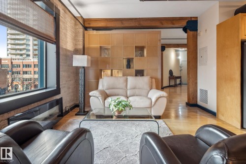 302 10169 104 Street, Edmonton, AB - Indoor Photo Showing Living Room With Fireplace