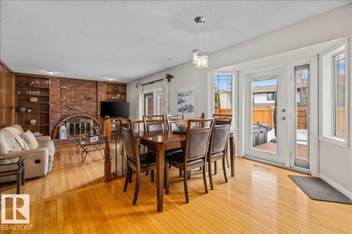 19 Lincoln Crescent, St. Albert, AB - Indoor Photo Showing Dining Room With Fireplace