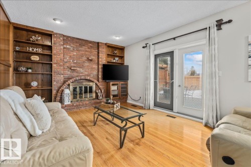 19 Lincoln Crescent, St. Albert, AB - Indoor Photo Showing Living Room With Fireplace