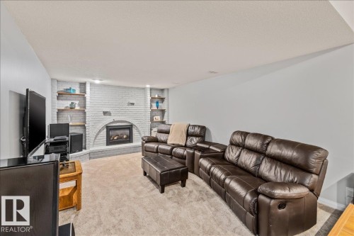 19 Lincoln Crescent, St. Albert, AB - Indoor Photo Showing Living Room With Fireplace