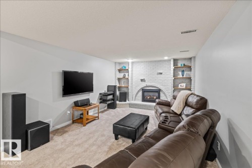 19 Lincoln Crescent, St. Albert, AB - Indoor Photo Showing Living Room With Fireplace