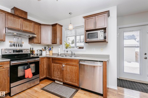 9359 74 Avenue, Edmonton, AB - Indoor Photo Showing Kitchen With Double Sink
