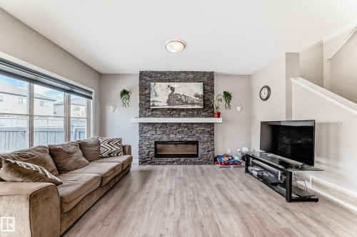 48 Gladstone Bend, Spruce Grove, AB - Indoor Photo Showing Living Room With Fireplace