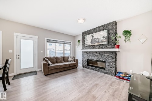 48 Gladstone Bend, Spruce Grove, AB - Indoor Photo Showing Living Room With Fireplace