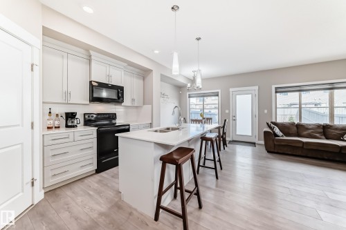 48 Gladstone Bend, Spruce Grove, AB - Indoor Photo Showing Kitchen With Double Sink