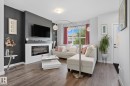 78 Garneau Gate, Spruce Grove, AB  - Indoor Photo Showing Living Room With Fireplace 