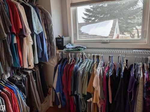 The property includes a closet with a window, offering natural light - 65 Coloniale Way, Beaumont, AB - Indoor With Storage