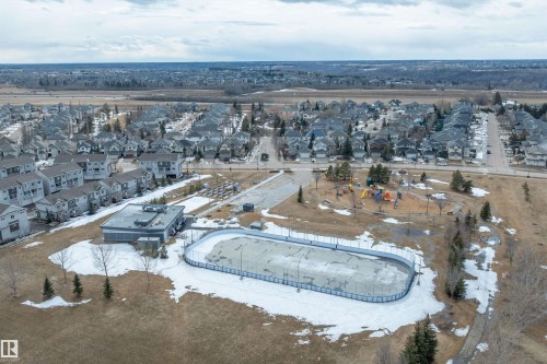 Aerial view showcasing a residential area with varied housing structures - 219 Crystal Creek Dr, Leduc, AB - Outdoor With View