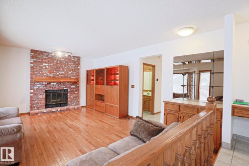 507 Burton Close, Edmonton, AB - Indoor Photo Showing Living Room With Fireplace