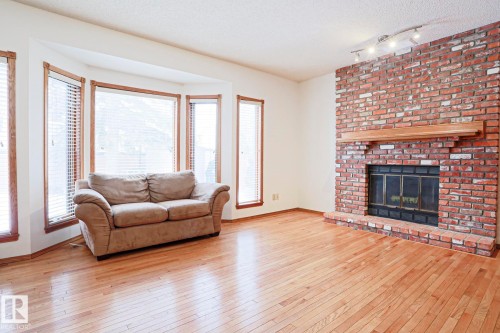 507 Burton Close, Edmonton, AB - Indoor Photo Showing Living Room With Fireplace