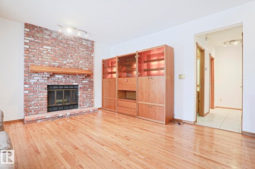 507 Burton Close, Edmonton, AB - Indoor Photo Showing Living Room With Fireplace
