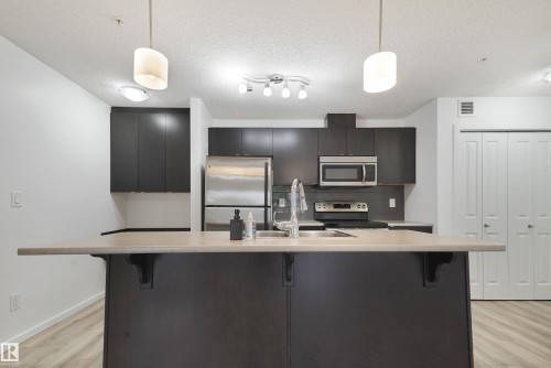114 3357 16A Avenue, Edmonton, AB - Indoor Photo Showing Kitchen With Upgraded Kitchen