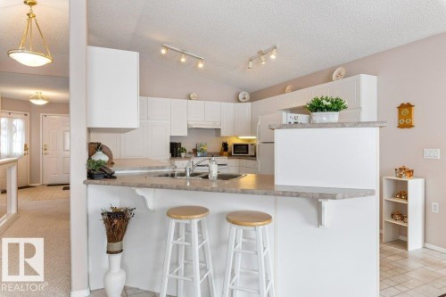 7605 165A Avenue, Edmonton, AB - Indoor Photo Showing Kitchen With Double Sink