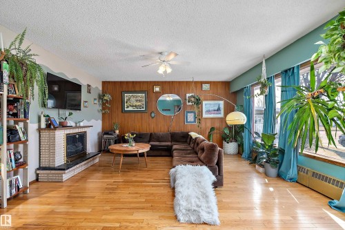 4710 54 Avenue, Wetaskiwin, AB - Indoor Photo Showing Living Room With Fireplace