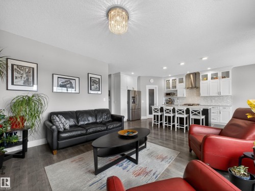 1047 Coopers Hawk Link Link, Edmonton, AB - Indoor Photo Showing Living Room