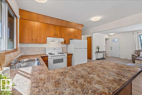 10013 106 Street, Fort Saskatchewan, AB - Indoor Photo Showing Kitchen With Double Sink