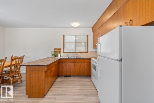10013 106 Street, Fort Saskatchewan, AB - Indoor Photo Showing Kitchen With Double Sink