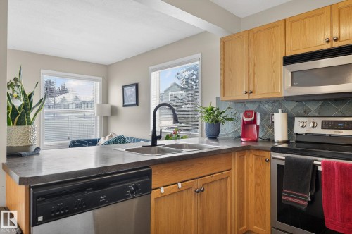 176 230 Edwards Drive, Edmonton, AB - Indoor Photo Showing Kitchen With Double Sink