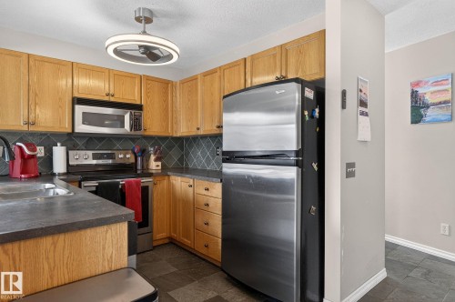 176 230 Edwards Drive, Edmonton, AB - Indoor Photo Showing Kitchen