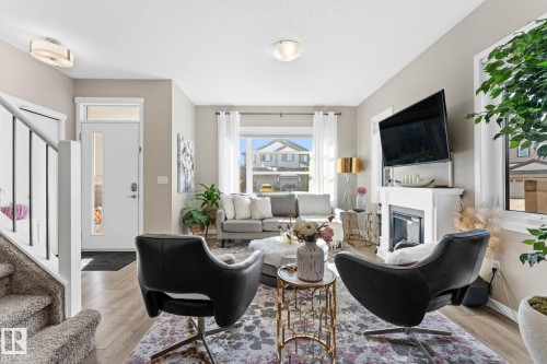 17159 49 Street, Edmonton, AB - Indoor Photo Showing Living Room With Fireplace