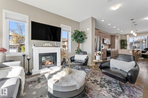 17159 49 Street, Edmonton, AB - Indoor Photo Showing Living Room With Fireplace