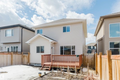 The property features a private fenced yard with a wooden deck - 4875 Wright Drive, Edmonton, AB - Outdoor With Deck Patio Veranda With Exterior