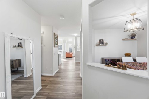 The property features light wood flooring and white walls, creating a bright and airy atmosphere - 31 Everitt Drive, St. Albert, AB - Indoor Photo Showing Other Room