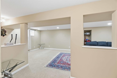 Spacious room featuring carpeting, recessed lighting, and neutral wall tones - 31 Everitt Drive, St. Albert, AB - Indoor