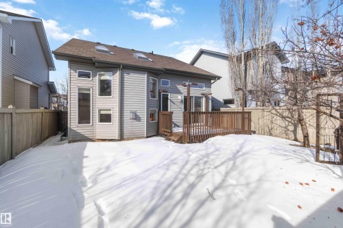 The property features a brown wood deck and a fenced yard - 31 Everitt Drive, St. Albert, AB - Outdoor