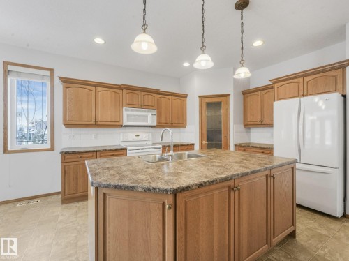 3436 32 Street, Edmonton, AB - Indoor Photo Showing Kitchen With Double Sink