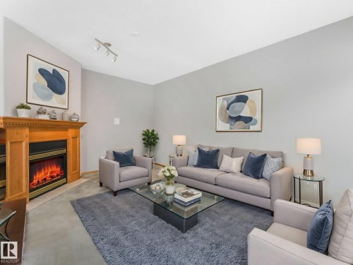 3436 32 Street, Edmonton, AB - Indoor Photo Showing Living Room With Fireplace