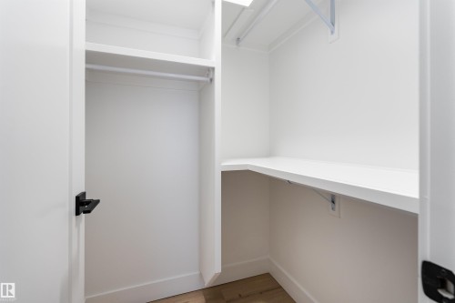 Spacious closet featuring light wood-style floors - 3109 Magpie Way, Edmonton, AB 