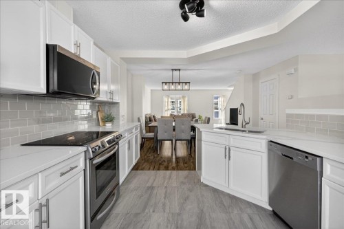 174 5604 199 Street, Edmonton, AB - Indoor Photo Showing Kitchen With Stainless Steel Kitchen With Double Sink