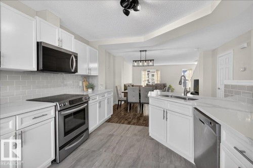 174 5604 199 Street, Edmonton, AB - Indoor Photo Showing Kitchen With Stainless Steel Kitchen With Double Sink With Upgraded Kitchen