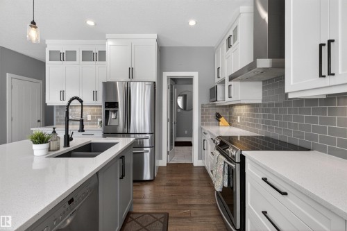 457 Meadowview Drive, Fort Saskatchewan, AB - Indoor Photo Showing Kitchen With Stainless Steel Kitchen With Double Sink With Upgraded Kitchen