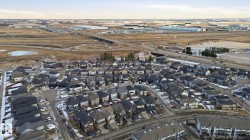 Aerial view showcasing a developed residential area with numerous detached properties - 