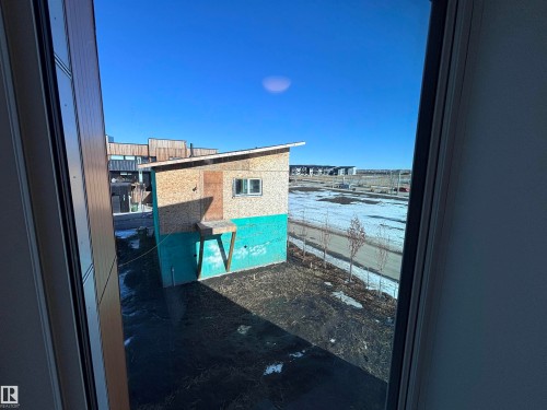 View of the surrounding neighbourhood, showcasing other properties and a clear sky - 2740 Blatchford Road, Edmonton, AB - Outdoor