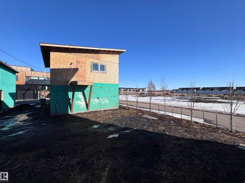 Property under construction with a visible window on the upper level and a sloped roofline - 2740 Blatchford Road, Edmonton, AB - Outdoor