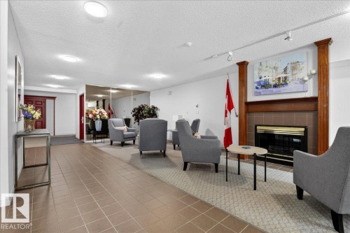 302 9760 176 Street, Edmonton, AB - Indoor With Fireplace