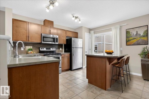 96 1804 70 Street, Edmonton, AB - Indoor Photo Showing Kitchen With Stainless Steel Kitchen With Double Sink