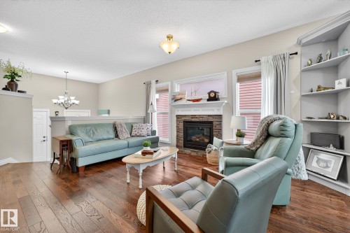 120 Keyport Circle, Leduc, AB - Indoor Photo Showing Living Room With Fireplace