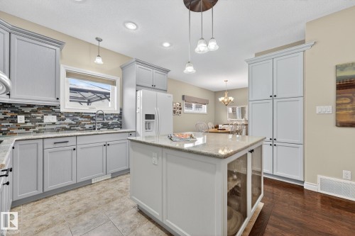 120 Keyport Circle, Leduc, AB - Indoor Photo Showing Kitchen With Double Sink With Upgraded Kitchen
