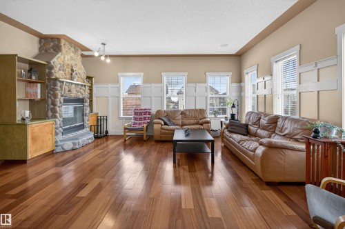 1 Chatwin Road, Sherwood Park, AB - Indoor Photo Showing Living Room With Fireplace