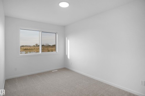 25 1430 Aster Way, Edmonton, AB - Indoor Photo Showing Other Room