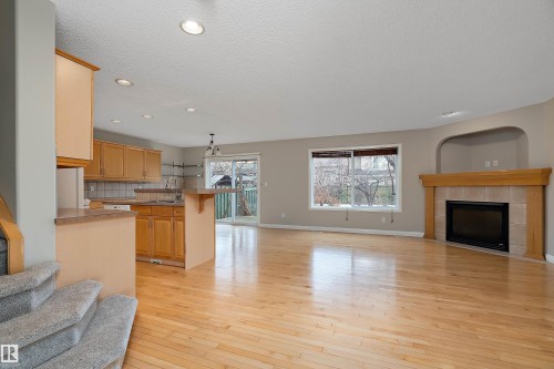 2176 Haddow Drive, Edmonton, AB - Indoor Photo Showing Living Room With Fireplace