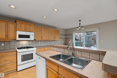 2176 Haddow Drive, Edmonton, AB - Indoor Photo Showing Kitchen With Double Sink