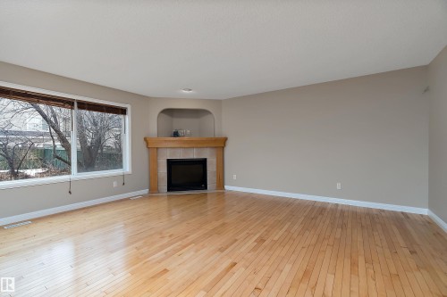 2176 Haddow Drive, Edmonton, AB - Indoor Photo Showing Living Room With Fireplace